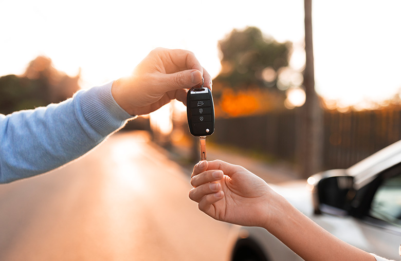 Customer receiving car keys